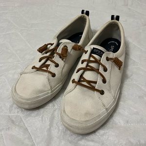 White Sperry slip-ons